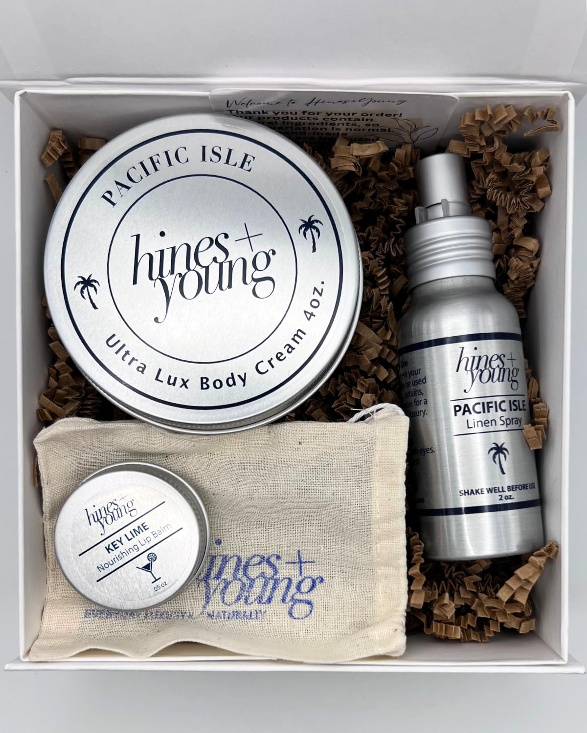 Hines+Young Travel Tins Gift Set - 4 oz Body Cream, 2 oz Linen Spray, Natural Lip Balm - Skin Care and Refreshing Home Fragrance, Ideal Self-Care Gift Set (Pack of 3, Pacific Isle)